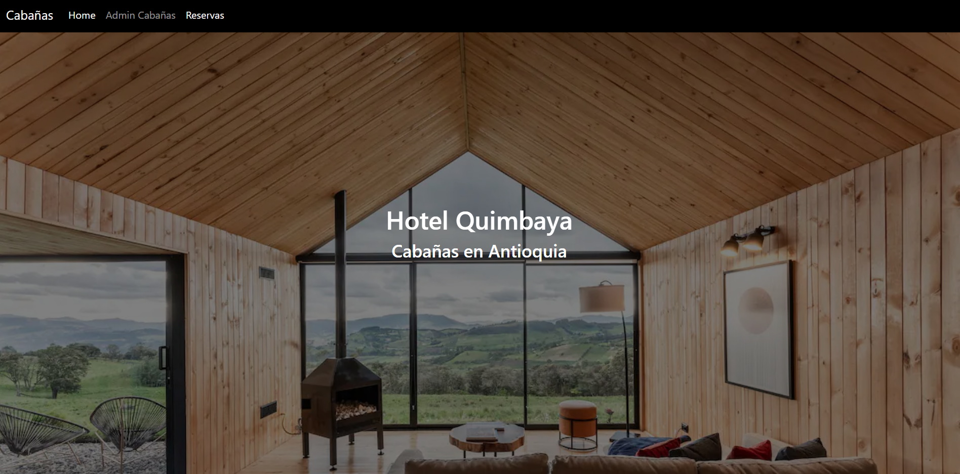 Screenshot of Hotel Quimbaya website. Top navigation bar shows options for 'Cabañas', 'Home', 'Admin Cabañas', and 'Reservas'. Main image displays interior of a wooden cabin with large windows overlooking a mountainous landscape. Centered text overlay reads 'Hotel Quimbaya' with 'Cabañas en Antioquia' below.